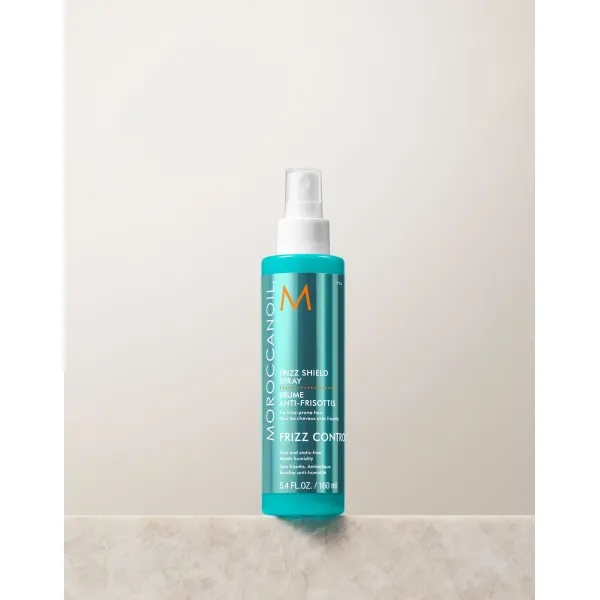 Спрей-антистатик від пухнастості волосся MoroccanOil Frizz Shield Spray Frizz Control 160 мл, зображення 2